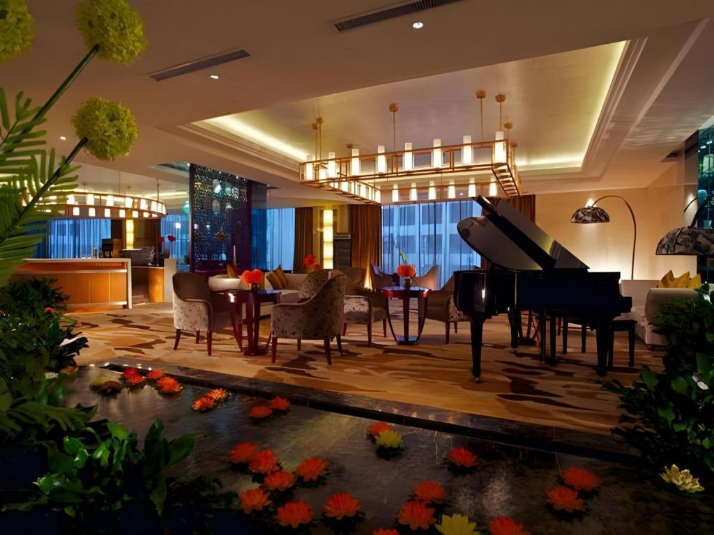 New Century Hotel Zaozhuang Fengming Exterior photo