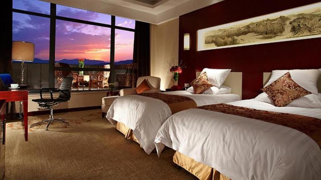 New Century Hotel Zaozhuang Fengming Exterior photo