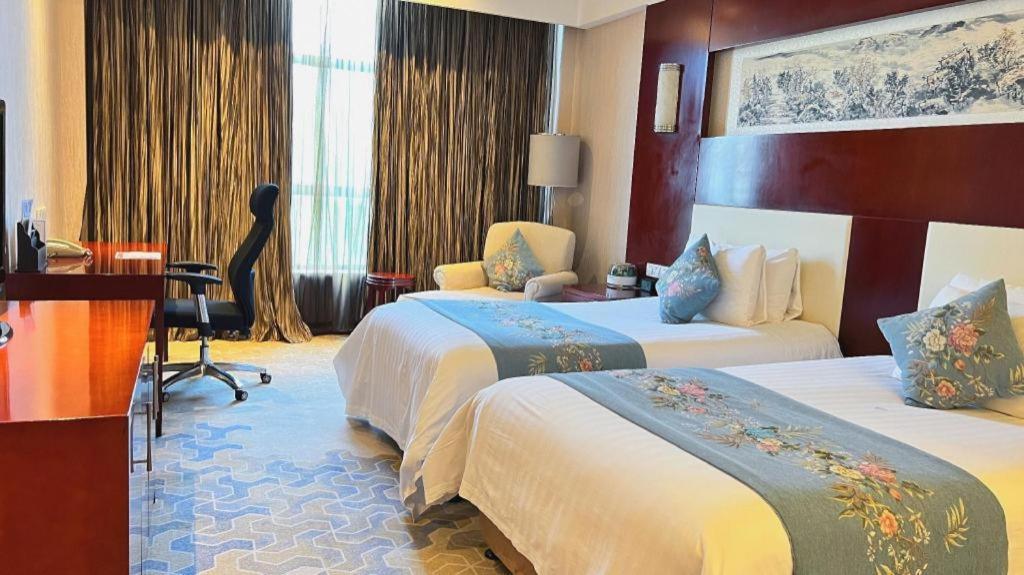 New Century Hotel Zaozhuang Fengming Exterior photo